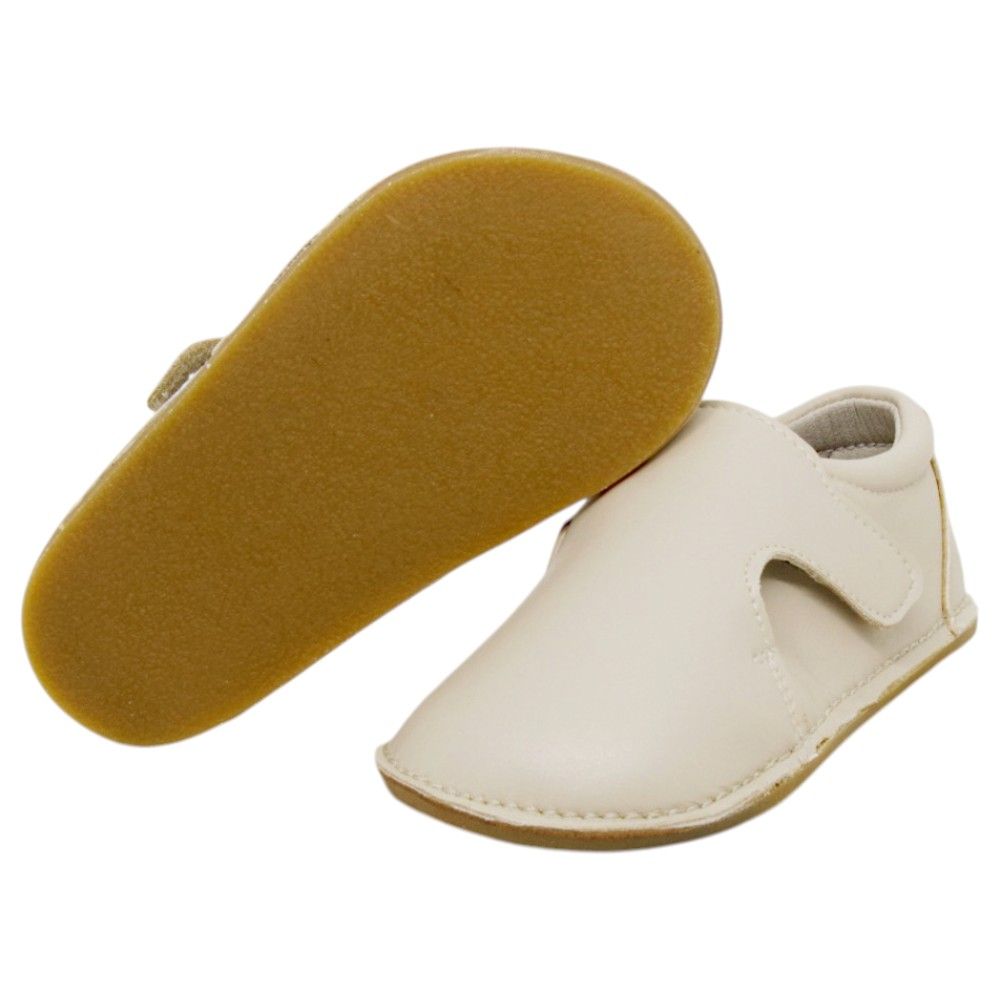 Zapatos respetuosos niños invierno Piruflex en hueso, microfibra con velcro, vista lateral