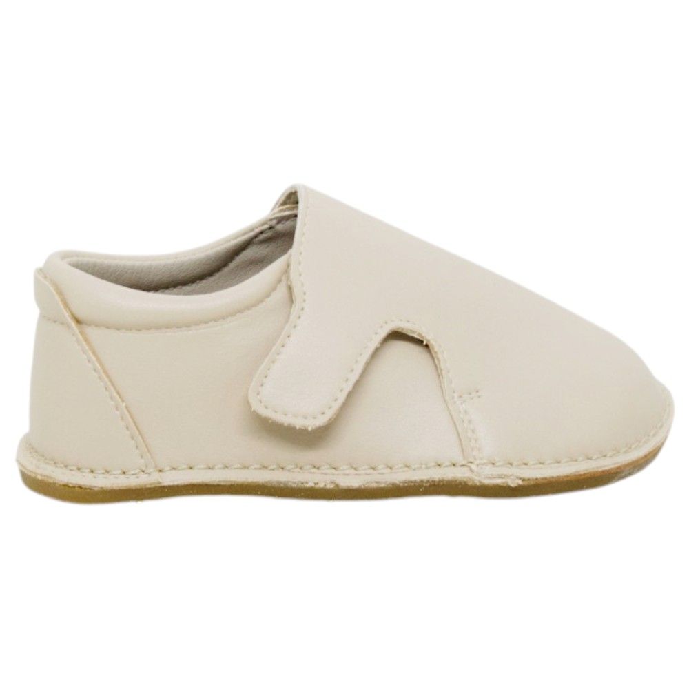 Zapatos respetuosos niños invierno Piruflex en hueso, microfibra con velcro, vista lateral